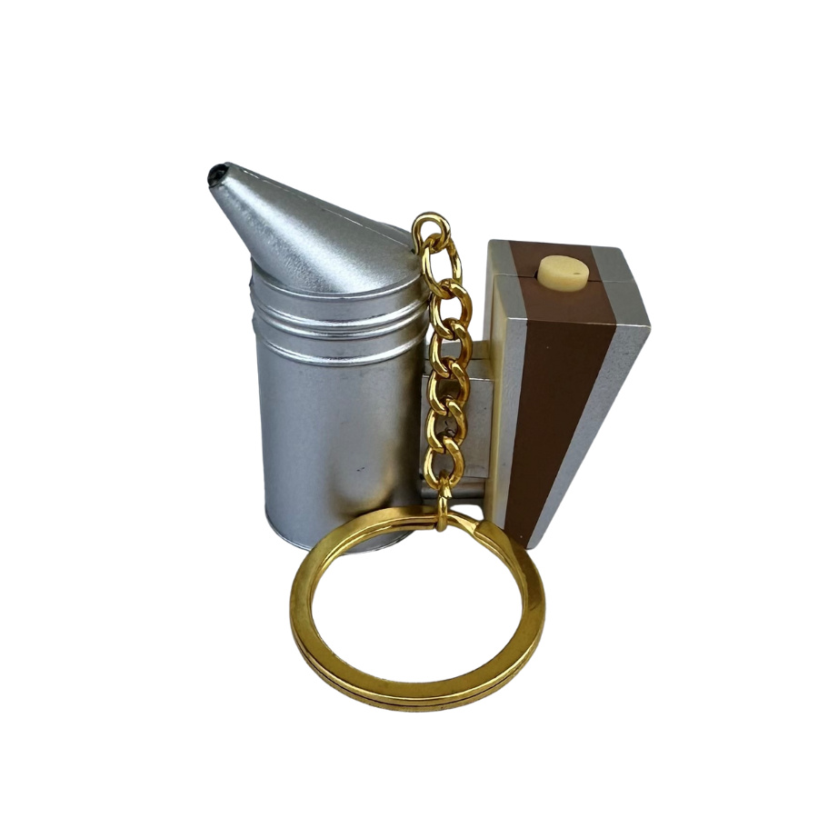 Nyckelring R�kpust med ficklampa