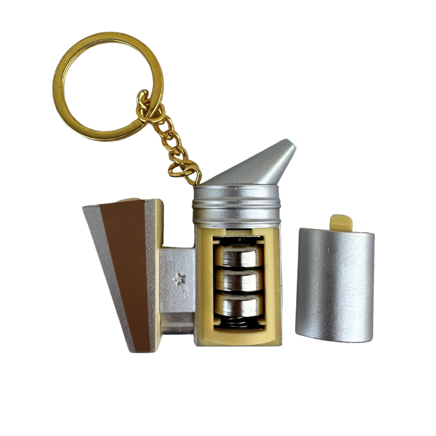 Nyckelring R�kpust med ficklampa